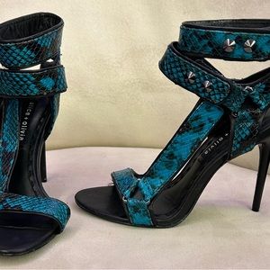 Barely worn snake skin Velcro strap